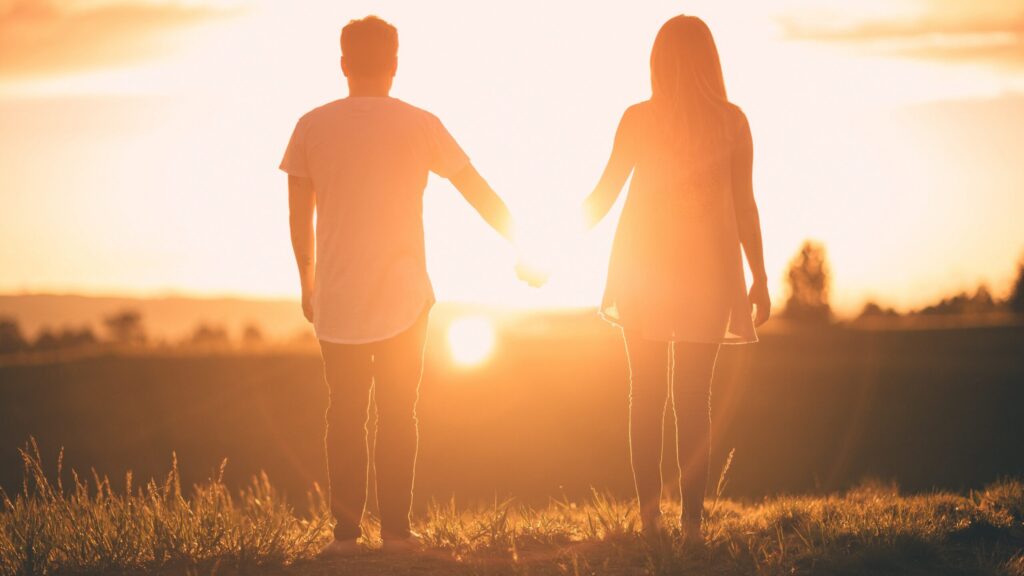 silhouette of teenage couple
